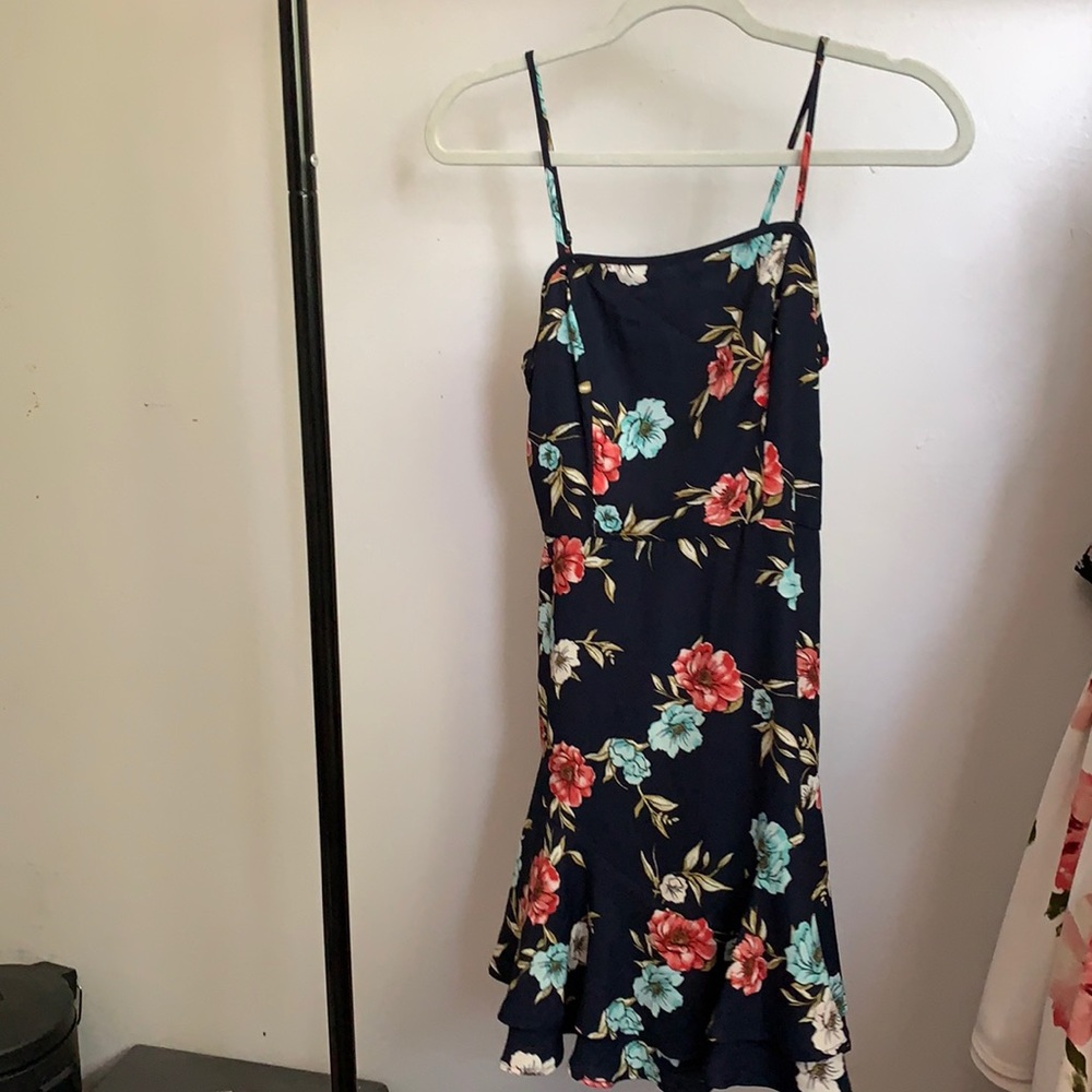 super cute fitting blue dress with a floral design